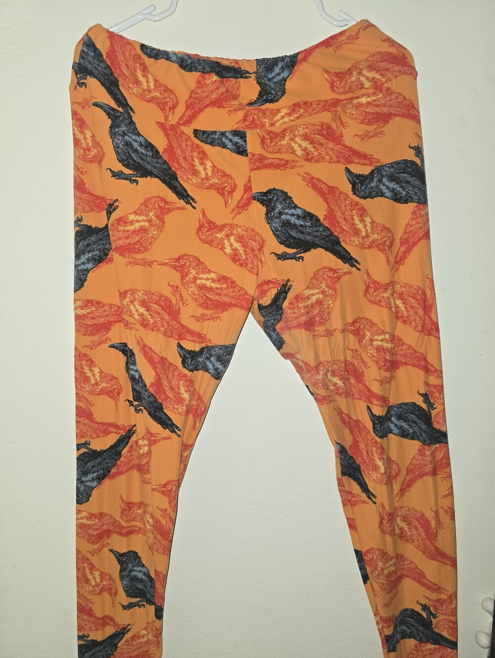 LuLaRoe Orange Leggings with Black & Red Bird Print